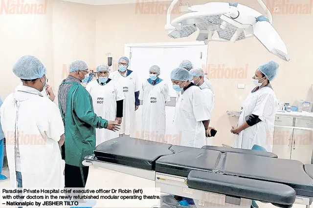 Dr Robin Sios explains medical things to the Medical team of Paradise Private Hospital.