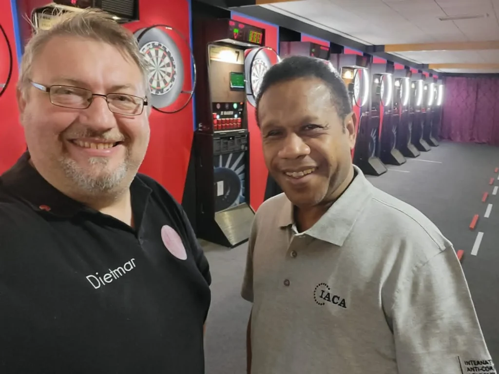 Left: Dietmar Schumann, World Darts Federation, Youth Commissioner and President of Austrian Darts Federation. Right: Molean Kilepak, president, National Darts Federation of PNG.