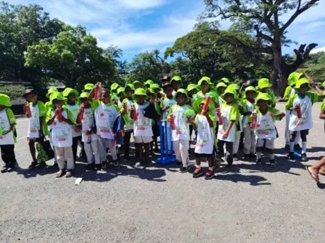 Under 10 Children receiving gift packs from BSP Bank